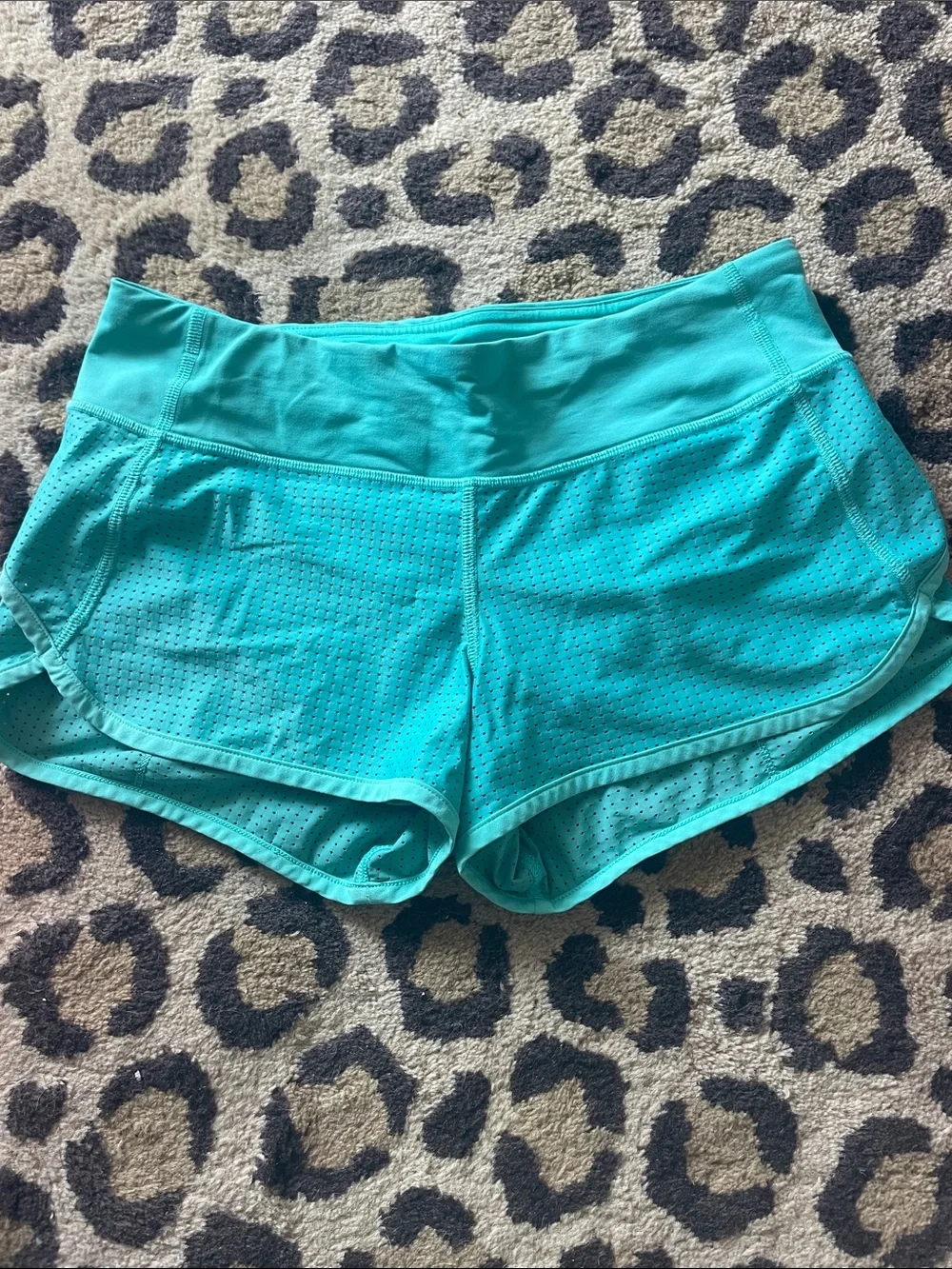 lululemon athletica turquoise perforated athletic shorts